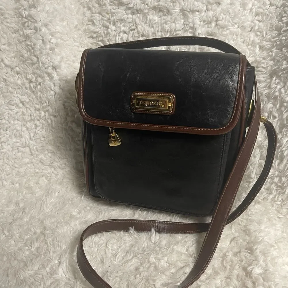 Capezio Black Leather Crossbody Bag with brown trim and gold tone hardwares